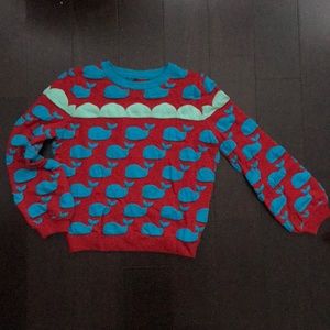 Red sweater with blue whales